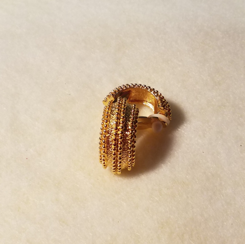 Gold tone clip-on earrings